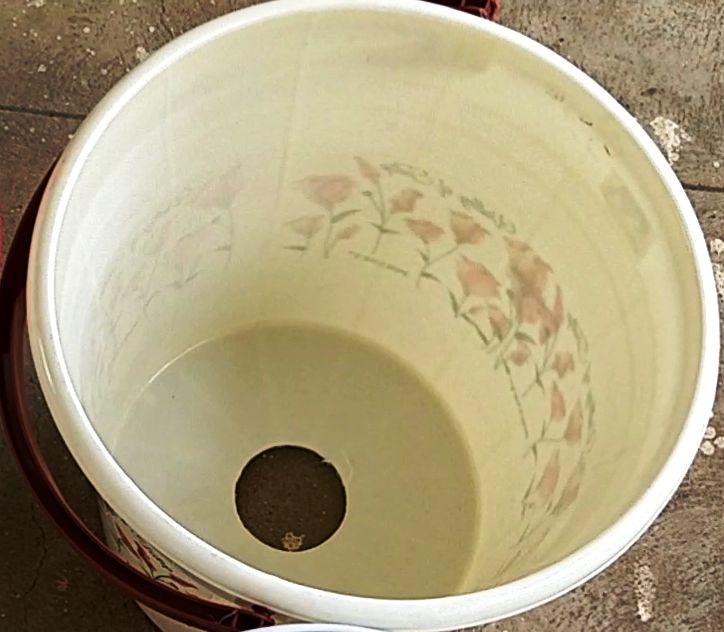 Outer bucket with circular hole cut inside view.jpg